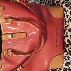 Dooney and Bourke pink bucket bag. Like new! FREE SHIPPING!Great Christmas gift!
